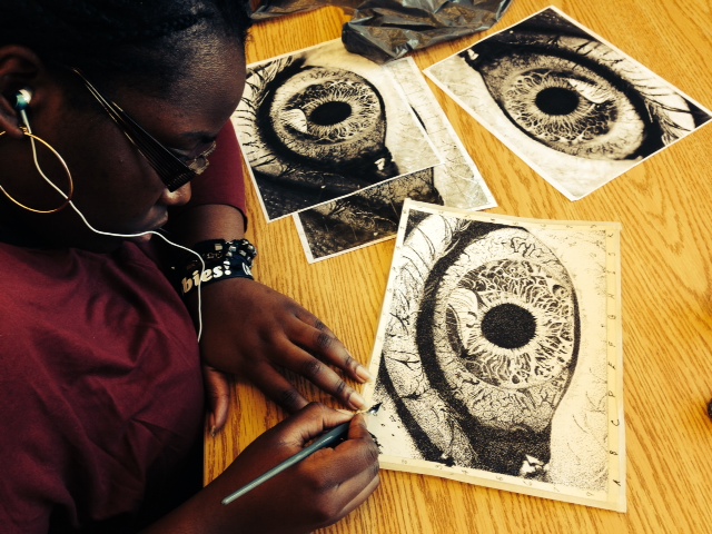 R. is creating her stippling project using the grid method and mastering the element "value"! Open Gallery